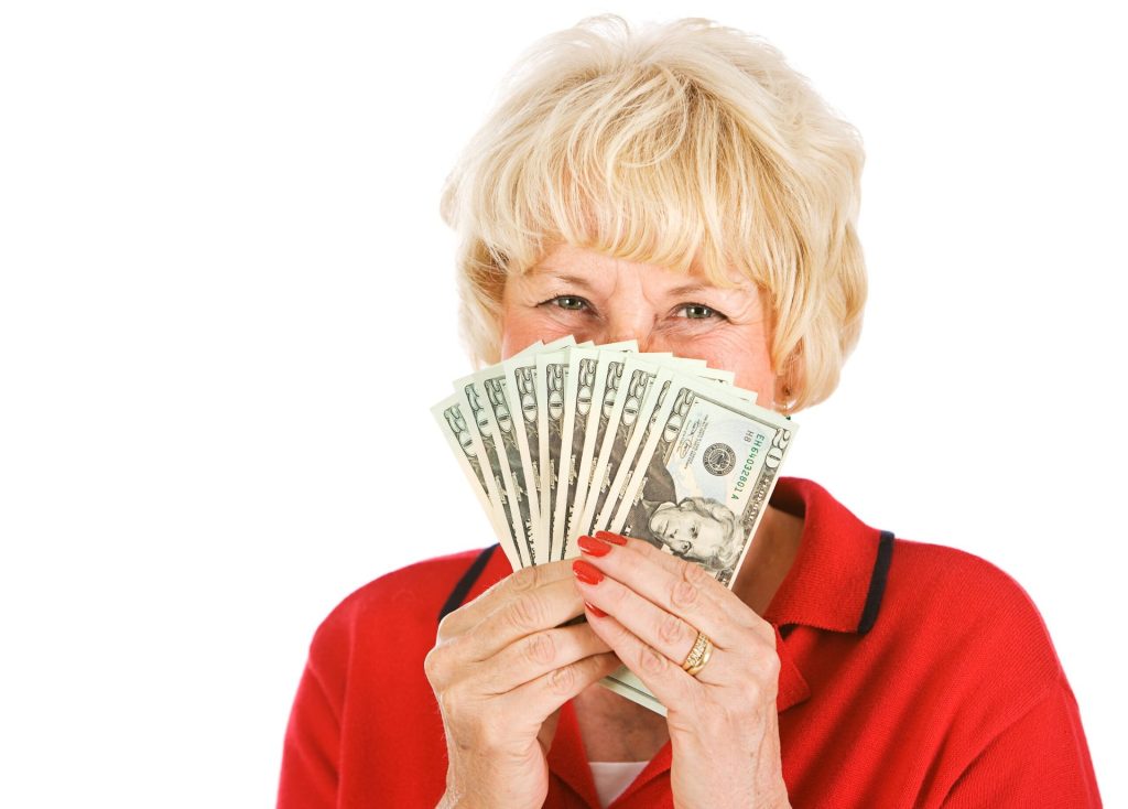 Senior woman with money