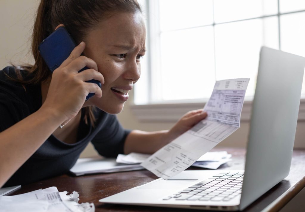 Woman discovering mortgage fraud