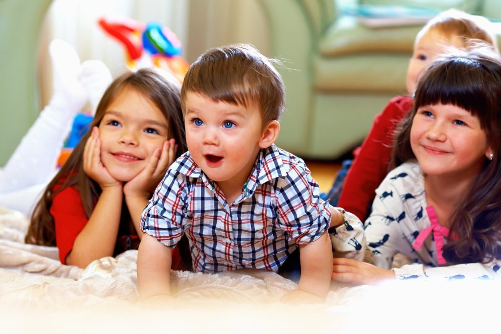 Young kids watching TV