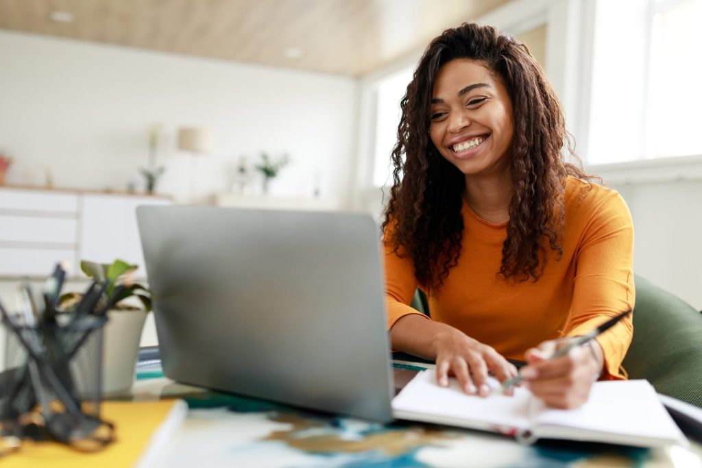 Woman sitting at a desk at home