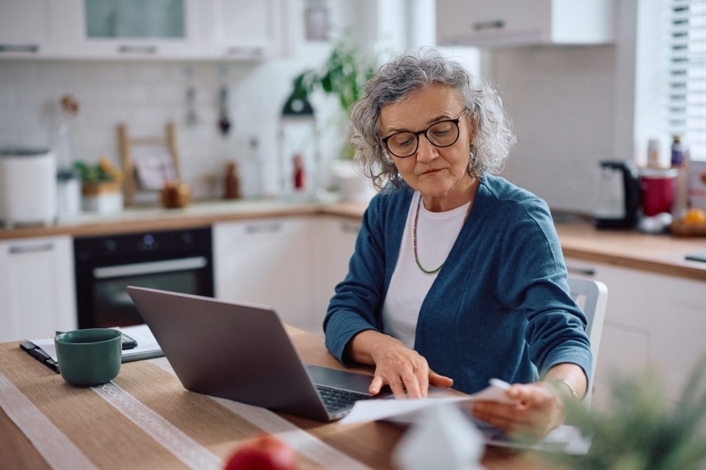 Senior woman working on her tax return