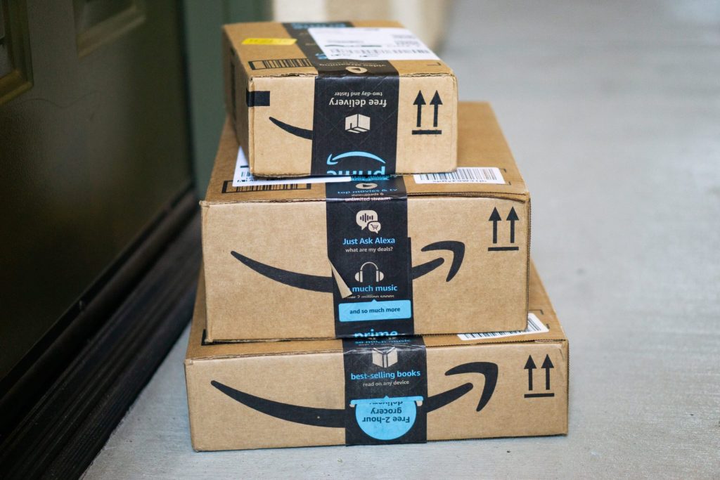 Amazon boxes delivered to a front doorstep