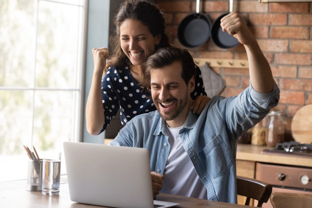 Happy couple with falling property taxes